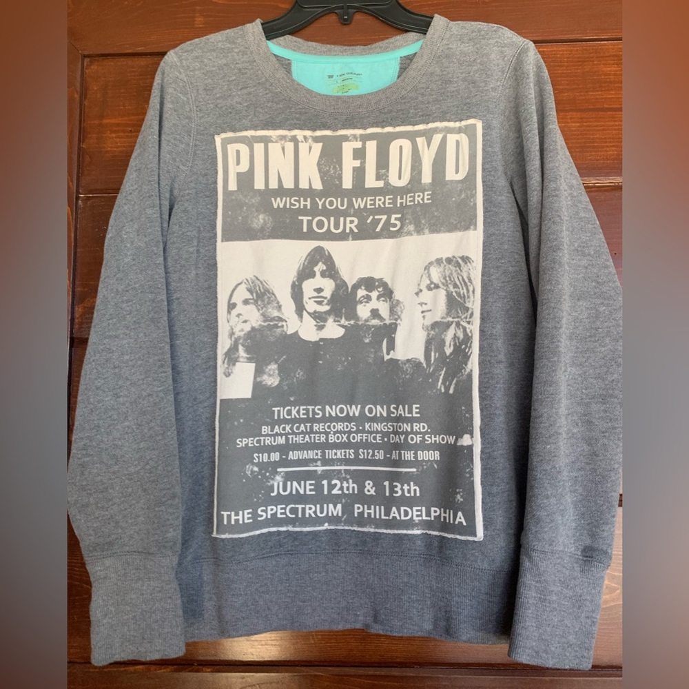 Women’s up-cycled grey crew neck sweatshirt.